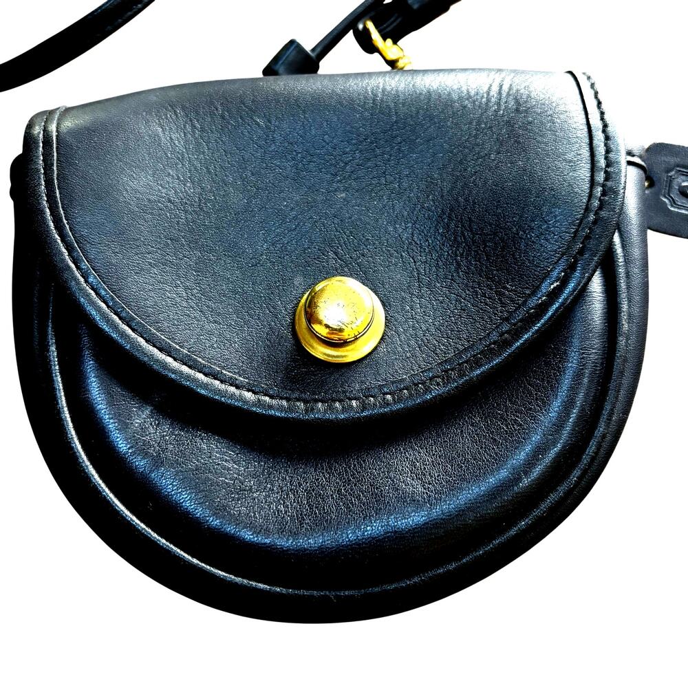 Coach black leather mini belt bag convertible to a shoulder or cross body purse